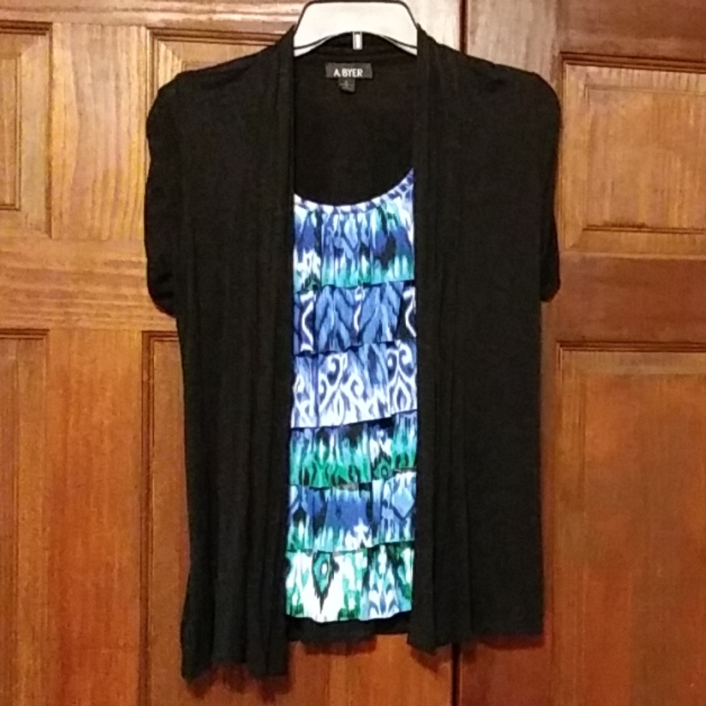 Short sleeve cardigan with shirt attached.